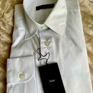 Zegna brand new cotton light blue shirt with buttons. With a tag